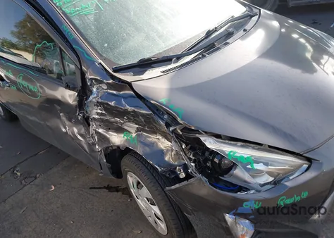 2015 Toyota Prius C from USA, damaged, VIN JTDKDTB33F1583432